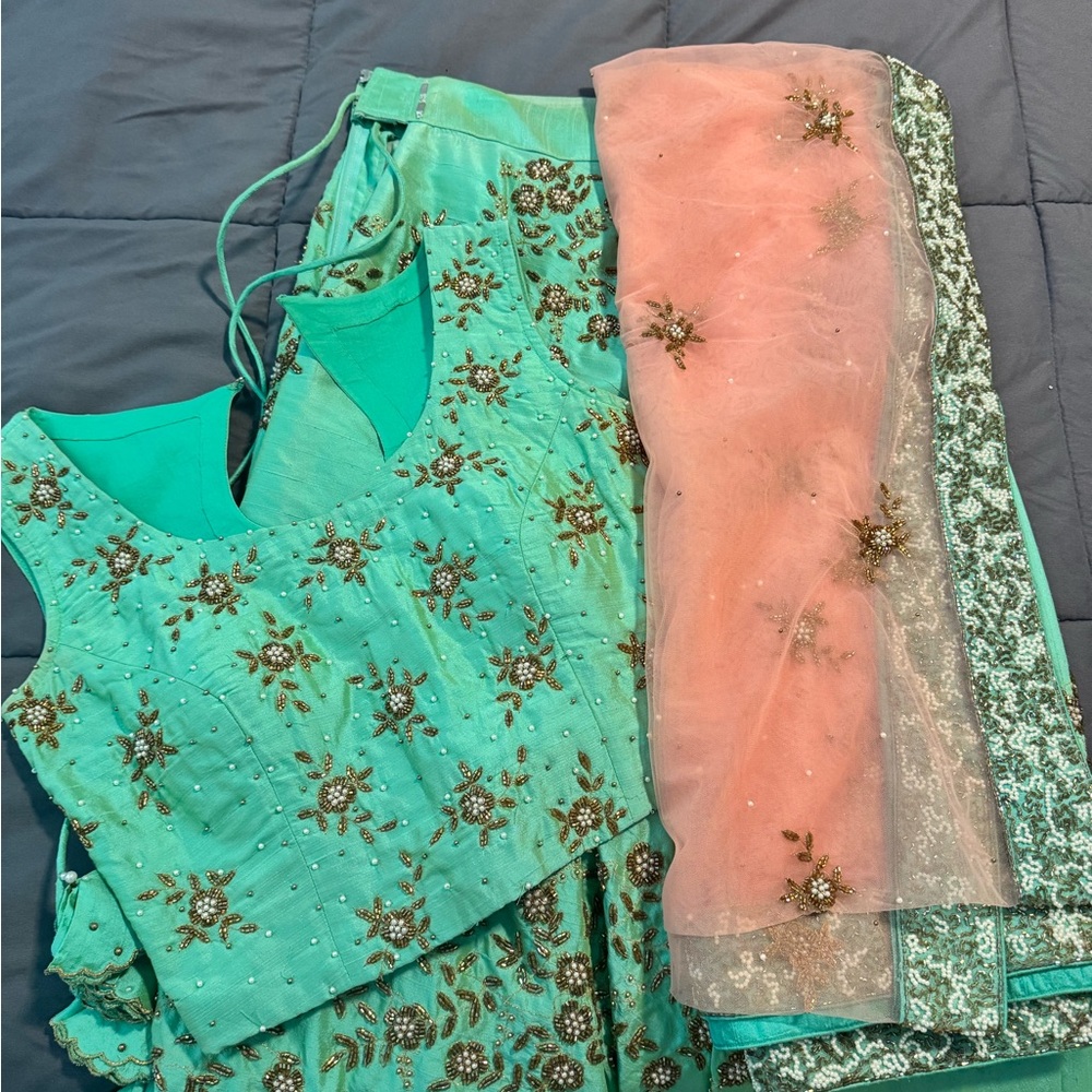 Milan Design Kochi lehenga & kundan jewelry necklace earrings